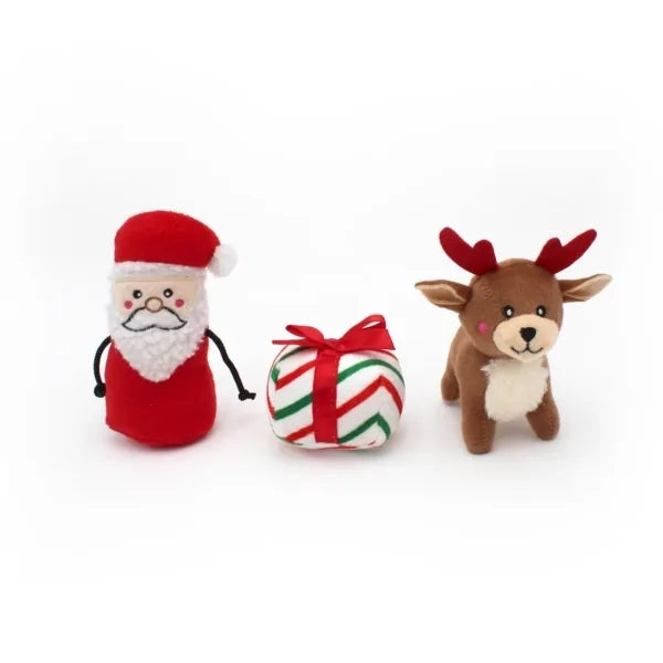 Three squeaky plush dog toys miniz from Zippy Paws. Santa, Reindeer and a present.